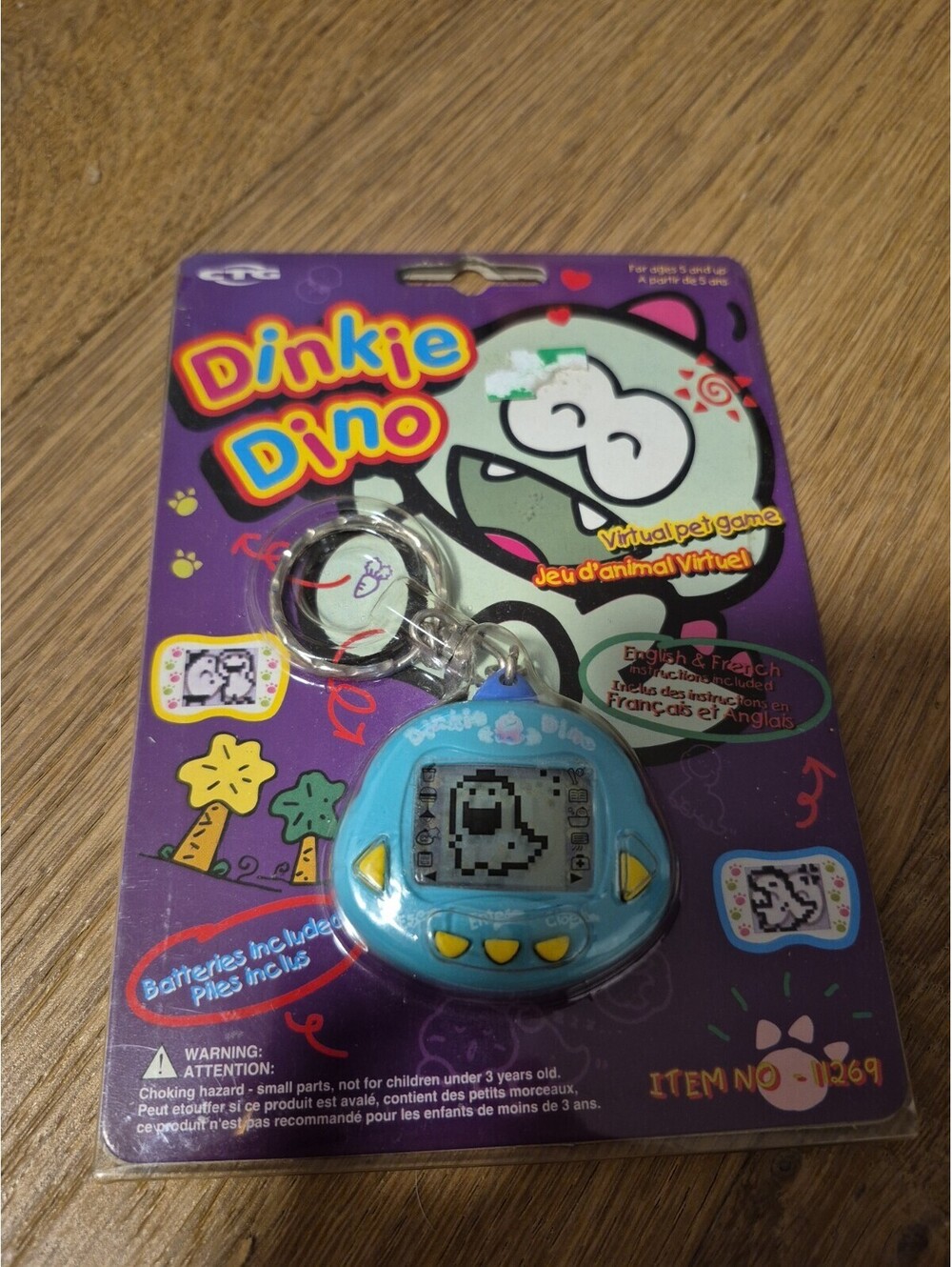 Dinkie Dino Electronic Virtual Pet RakuRaku Dinokun Teal Green Turquoise English